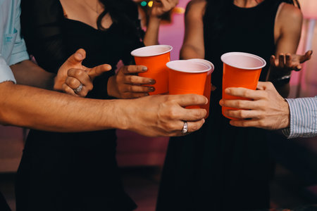 Diversity, dinner and group of people toast celebration together at party. Friends, happy and celebrate with food, wine and friendship for love, support and cheers at business functionの写真素材