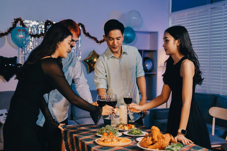 Diversity, dinner and group of people toast celebration together at party. Friends, happy and celebrate with food, wine and friendship for love, support and cheers champagne at business functionの写真素材