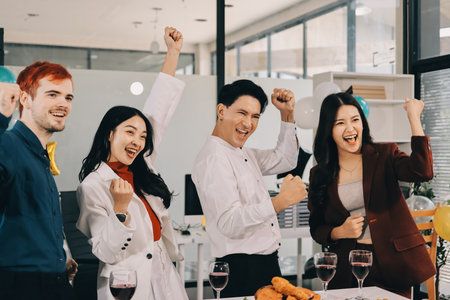 Diversity, dinner and group of people toast celebration together at party. Friends, happy and celebrate with food, wine and friendship for love, support and cheers champagne at business functionの写真素材