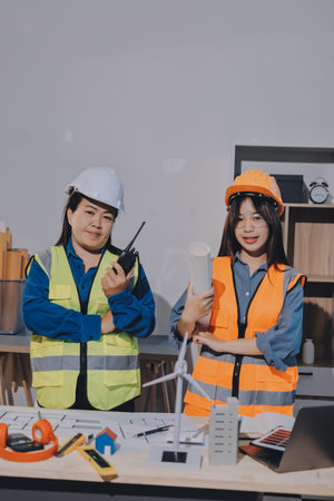 Architects and engineers working collaboratively on construction projectの写真素材