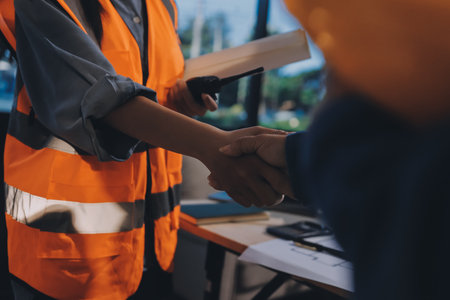 Architects and engineers working collaboratively on construction projectの写真素材