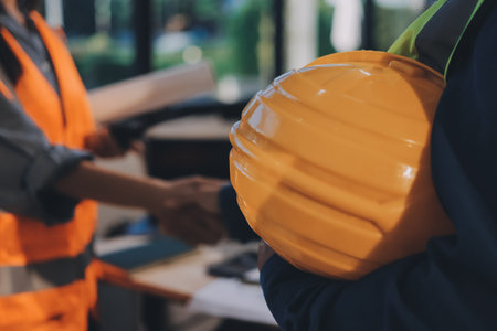 Architects and engineers working collaboratively on construction projectの写真素材