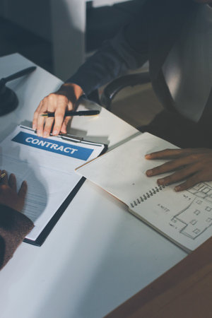 Lawyer explained to the client about the law that must be brought against the court case.の写真素材