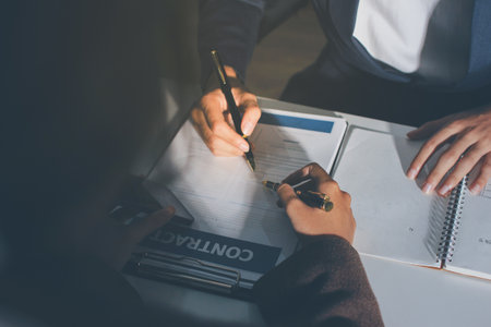 Lawyer explained to the client about the law that must be brought against the court case.の写真素材