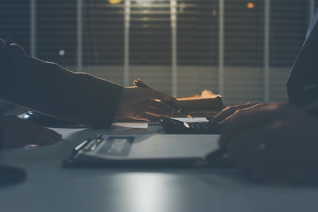 Lawyer explained to the client about the law that must be brought against the court case.の写真素材