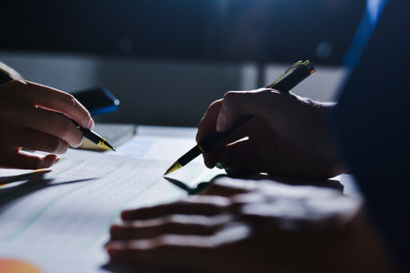 business people in meeting discussing plans togetherの写真素材