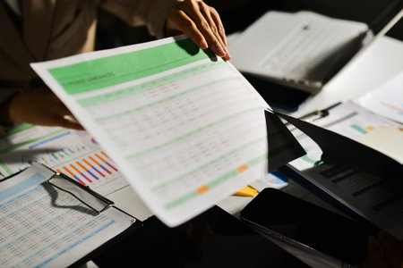 business people in meeting discussing plans togetherの写真素材