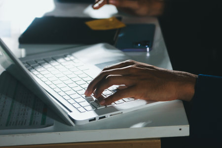 Business Team Analyzing Financial Data in Modern Officeの写真素材