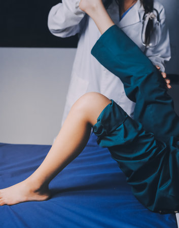 Rehabilitation therapy Professional male physiotherapists working in rehabilitation centers while...
