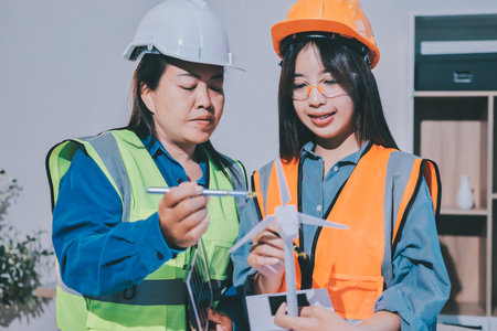 Architects and engineers working collaboratively on construction projectの写真素材