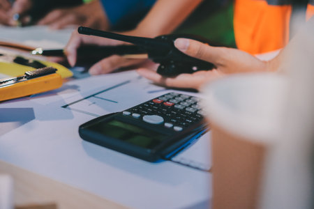 Architects and engineers working collaboratively on construction projectの写真素材