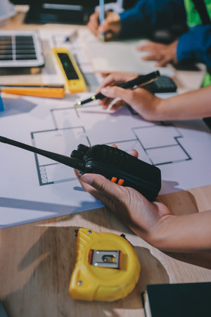 Architects and engineers working collaboratively on construction projectの写真素材