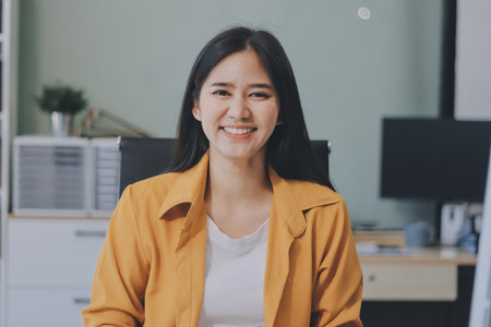 Woman sitting in office.