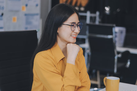 Business woman using calculator for math finance on wooden desk in office and business working...