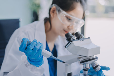 Portrait, science and happy woman on laptop in lab to research chemistry, test or innovation....