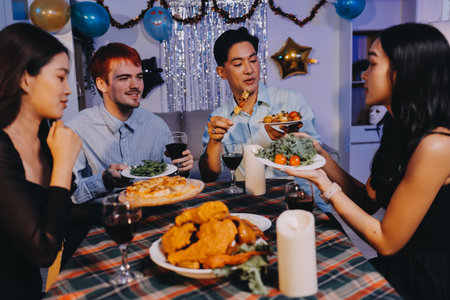 Diversity, dinner and group of people toast celebration together at party. Friends, happy and celebrate with food, wine and friendship for love, support and cheers champagne at business functionの写真素材