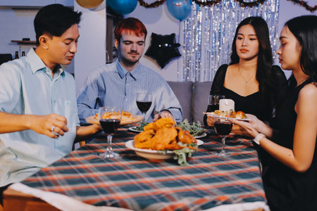 Diversity, dinner and group of people toast celebration together at party. Friends, happy and...