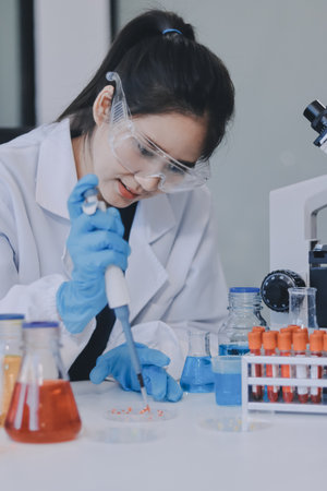 Portrait, science and woman on laptop in lab to research chemistry, test or innovation. Microscope,...