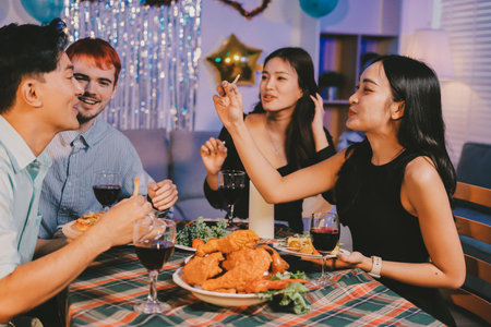 Diversity, dinner and group of people toast celebration together at party. Friends, happy and celebrate with food, wine and friendship for love, support and cheers champagne at business functionの写真素材