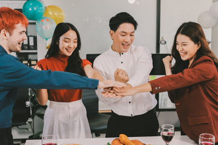 Diversity, dinner and group of people toast celebration together at party. Friends, happy and...