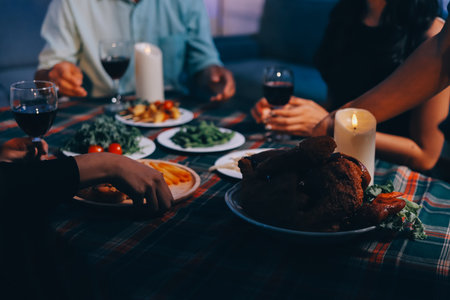 Diversity, dinner and group of people toast celebration together at party. Friends, happy and celebrate with food, wine and friendship for love, support and cheers champagne at business functionの写真素材