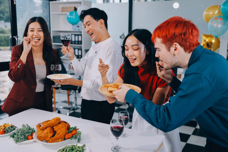 Diversity, dinner and group of people toast celebration together at party. Friends, happy and celebrate with food, wine and friendship for love, support and cheers champagne at business functionの写真素材