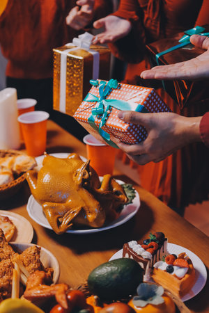 Festive Office Christmas Party with Delicious Food. A beautifully decorated office space with Christmas trees and festive lights, set up for a holiday party.の写真素材