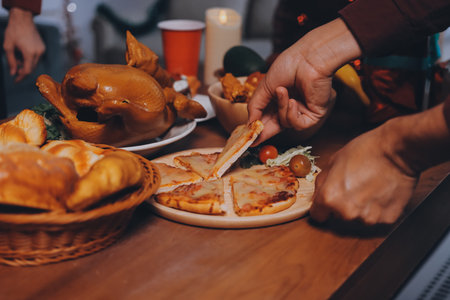 Festive Office Christmas Party with Delicious Food. A beautifully decorated office space with Christmas trees and festive lights, set up for a holiday party.の写真素材