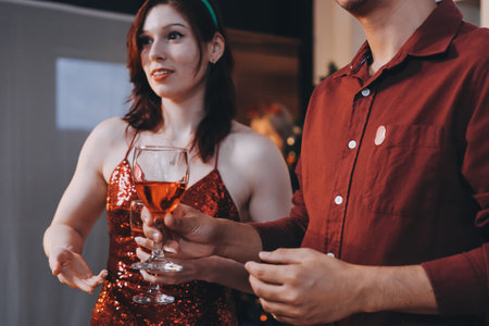 Festive Office Christmas Party with Delicious Food. A beautifully decorated office space with Christmas trees and festive lights, set up for a holiday party.の写真素材