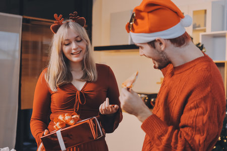 Festive Office Christmas Party with Delicious Food. A beautifully decorated office space with Christmas trees and festive lights, set up for a holiday party.の写真素材