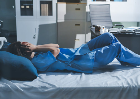 A patient with depression looks outside.の写真素材