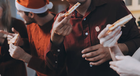 Festive Office Christmas Party with Delicious Food. A beautifully decorated office space with...