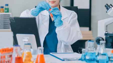 Portrait, science and happy woman on laptop in lab to research chemistry, test or innovation....