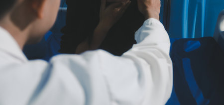 Doctor holding patient's hands offering comfort and support