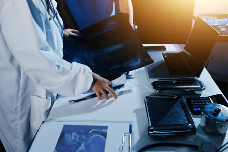Doctors are meeting at the hospital to discuss treatment options and share experiences with...
