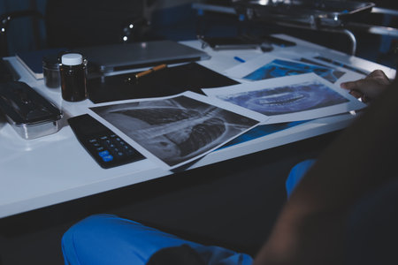 Doctors are meeting at the hospital to discuss treatment options and share experiences with colleagues.の写真素材