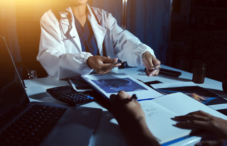 Doctors are meeting at the hospital to discuss treatment options and share experiences with...
