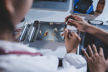Doctors are meeting at the hospital to discuss treatment options and share experiences with...