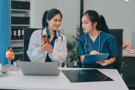 Medical, meeting and laptop for team in office in discussion, brainstorming and planning. Doctor,...