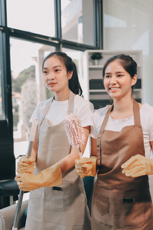 Cleaners clean empty office spacesの写真素材
