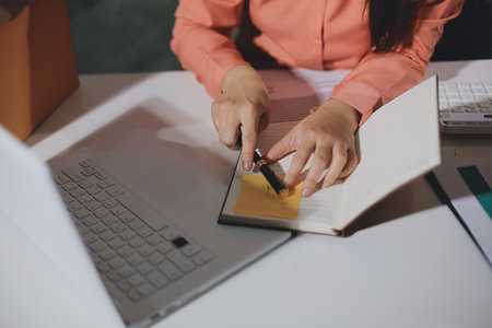 Startup, small business, SME owner check online orders. data logging Business growth, selling...