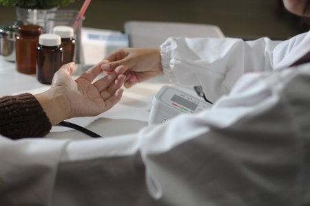 A doctor's hands carefully taking a patient's blood pressure using a sphygmomanometer.