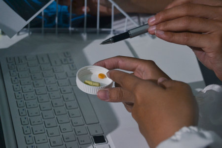 Doctor Explaining X-Ray Results to a Patient Using a Digital Device