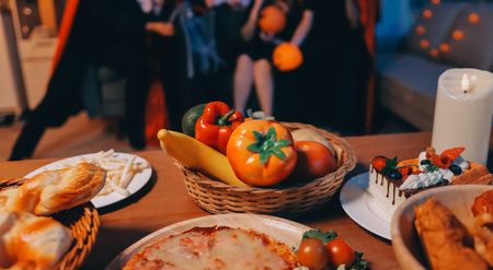 Friends enjoying a Halloween party at a barの写真素材