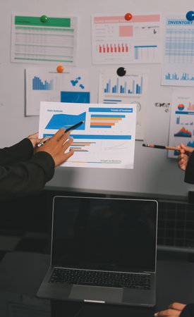 business people in meeting discussing plans togetherの写真素材