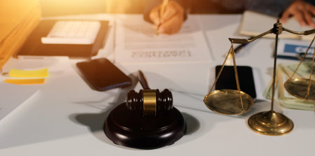Businesswoman and Male lawyer or judge consult and conference having team meeting with client at law...