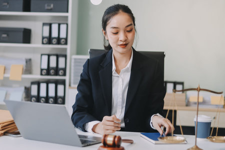 Lawyer explained to the client about the law that must be brought against the court case.の写真素材