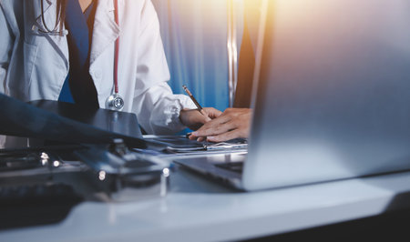 Doctors are meeting at the hospital to discuss treatment options and share experiences with...