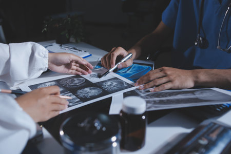 Doctors are meeting at the hospital to discuss treatment options and share experiences with colleagues.の写真素材