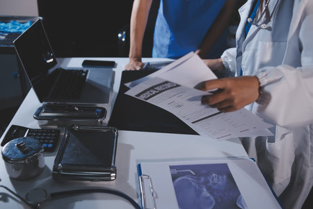 Doctors are meeting at the hospital to discuss treatment options and share experiences with...